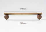 NATUROX Möbelgriff mit Holzakzent 128 mm – Bronze Metallgriff mit Walnussholz | Moderner Schrankgriff | Warme Designoptik